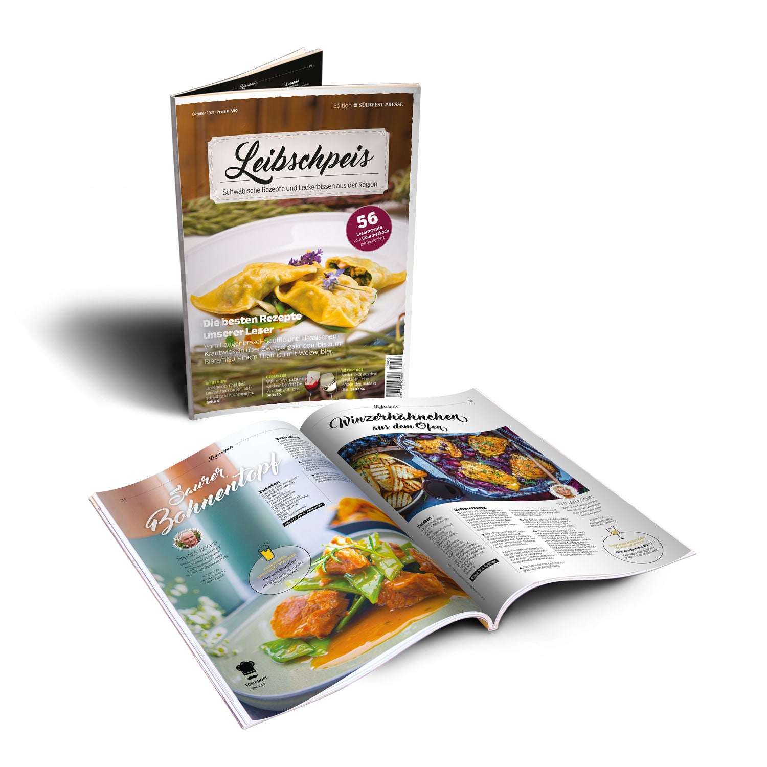 Auf einer flachen Fläche liegt ein aufgeschlagenes Magazin mit bunten Essensbildern und deutschem Text. Daneben steht aufrecht die Leibschpeis 2021 I 3. Ausgabe mit einem Cover mit einem Pastagericht und einer Flasche Wein.