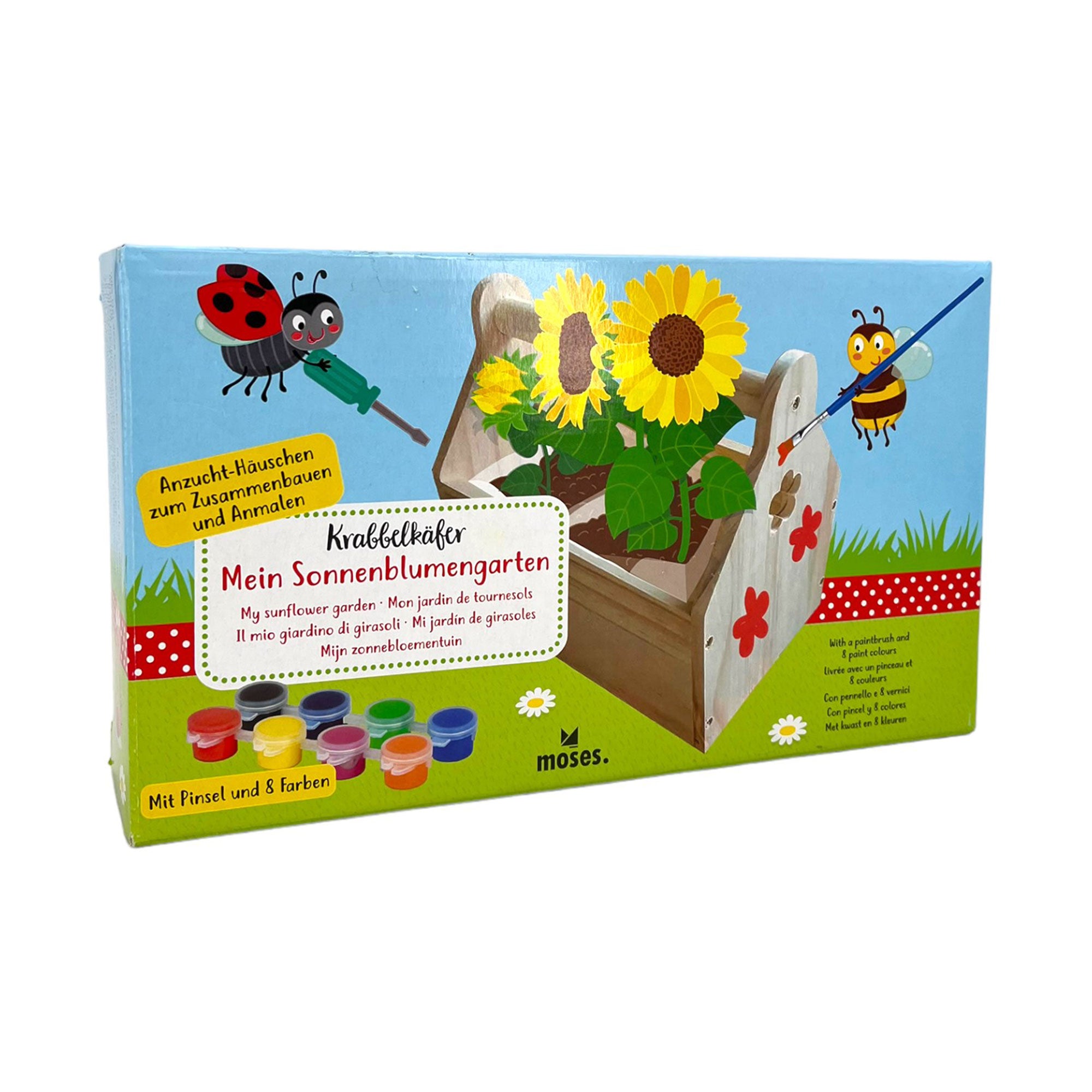 Die farbenfrohe Verpackung des Krabbelkäfers „Mein Sonnenblumengarten“ zeigt einen Marienkäfer, eine Sonnenblume und eine Biene. Im Lieferumfang sind Pinsel, sechs Farbtöpfe und eine illustrierte Montageanleitung enthalten. Der Text ist in mehreren Sprachen verfügbar.