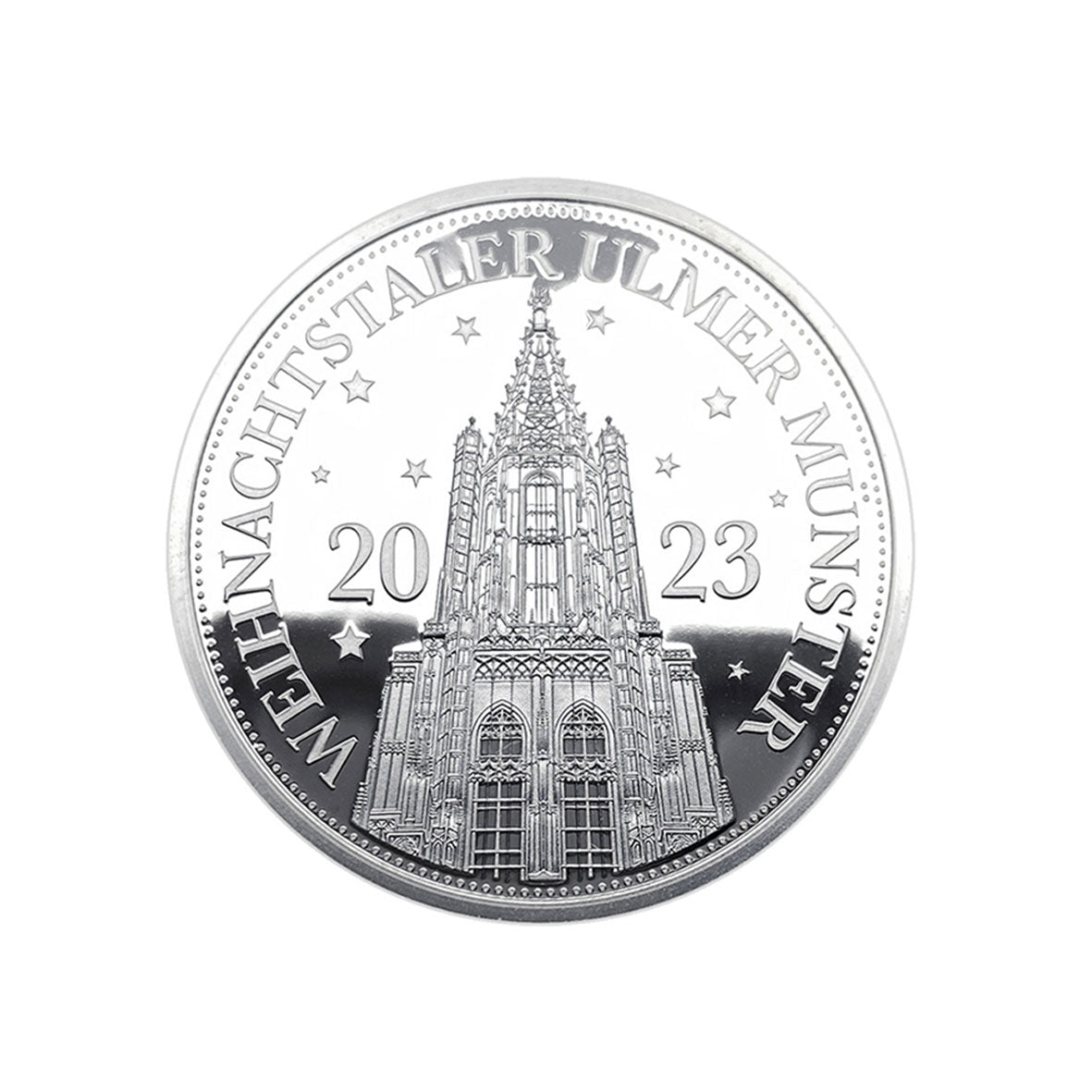 Der Ulmer Weihnachtstaler 2023 Feinsilber ist eine Silbermünze mit dem Ulmer Münster, der Jahreszahl 2023 und „WEIHNACHTSTALER ULMER MÜNSTER“ mit Sternen – ein begehrtes Sammlerobjekt in edler Silberprägung.