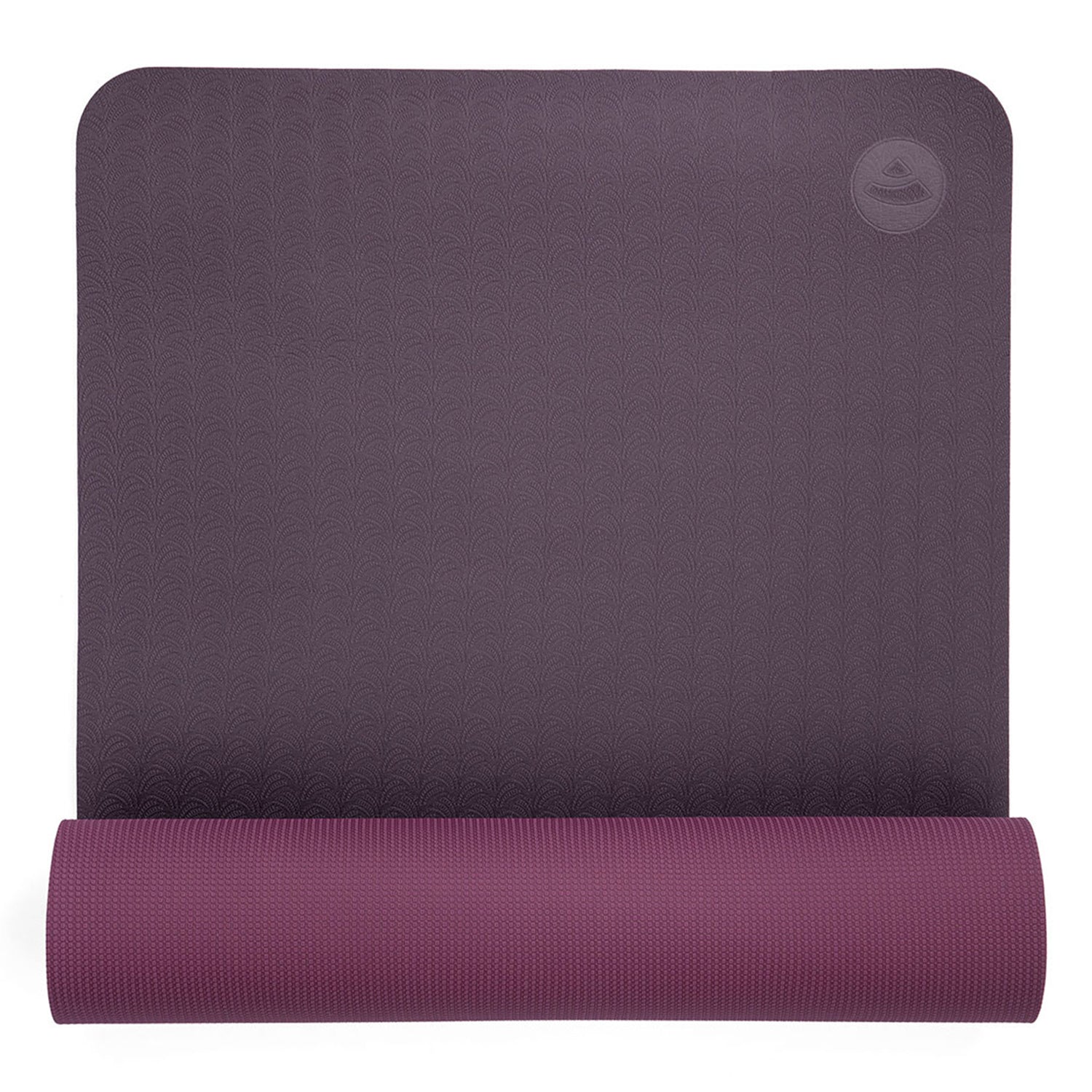 Die Yogamatte LOTUS PRO in Lila aus umweltfreundlichem TPE ist teilweise auf weißem Untergrund ausgerollt. Sie besticht durch ein dezentes Strukturmuster und ein kleines, kreisförmiges Logo in einer Ecke.