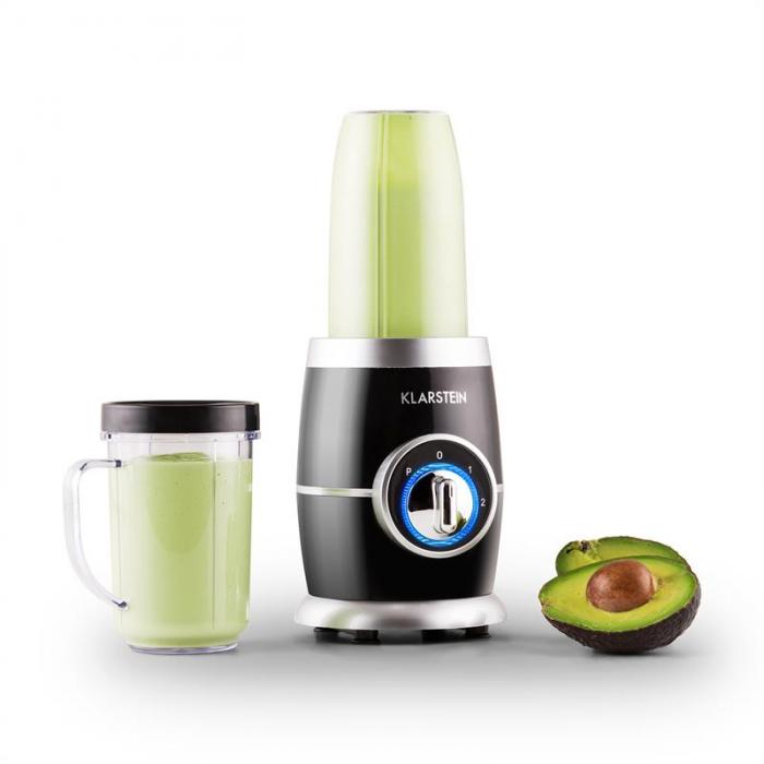 Schwarz-silberner Klarstein Smoothie-Maker mit zwei Mixbechern gefüllt mit Avocado – abgebildet auf weißem Hintergrund.